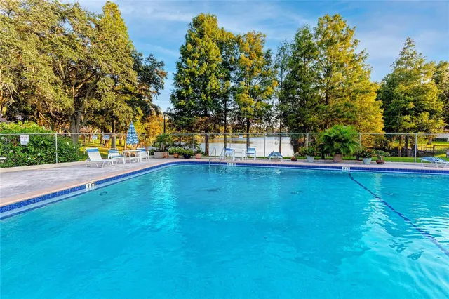 a view of a swimming pool with an outdoor space