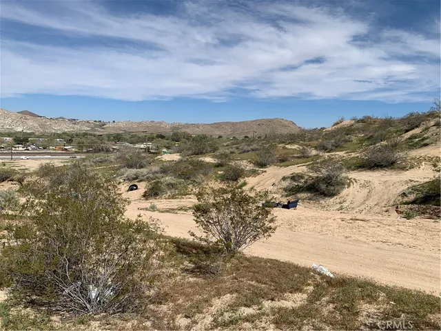 a view of mountain view with mountains in the background