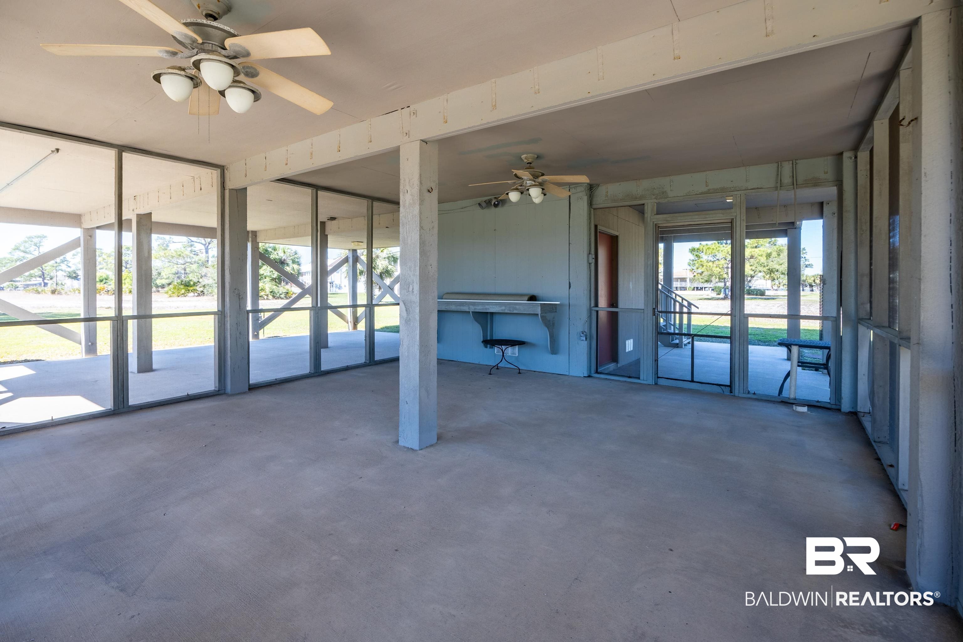 27321 Marina Road Orange Beach, AL 36561 - Photo 53 of 55 Interior space featuring concrete flooring and ceiling fan