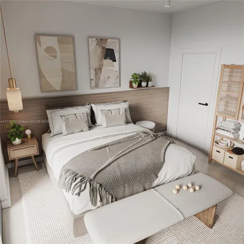 a bedroom with a bed and a couch