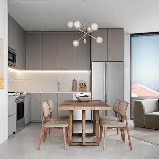 a dining room with furniture and window