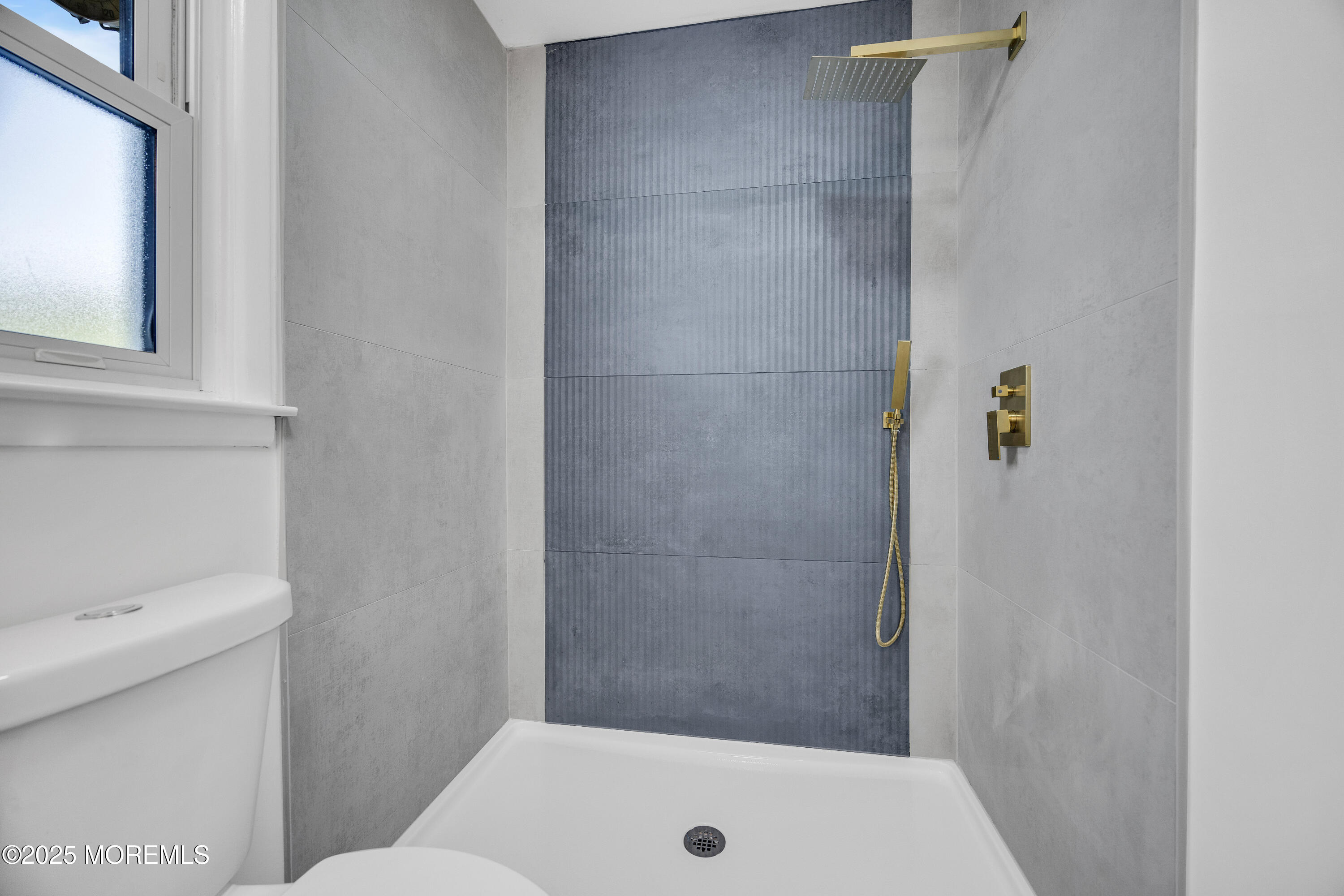 37 Central Boulevard Brick, NJ 08724 - Photo 17 of 32 a bathroom with a sink and toilet