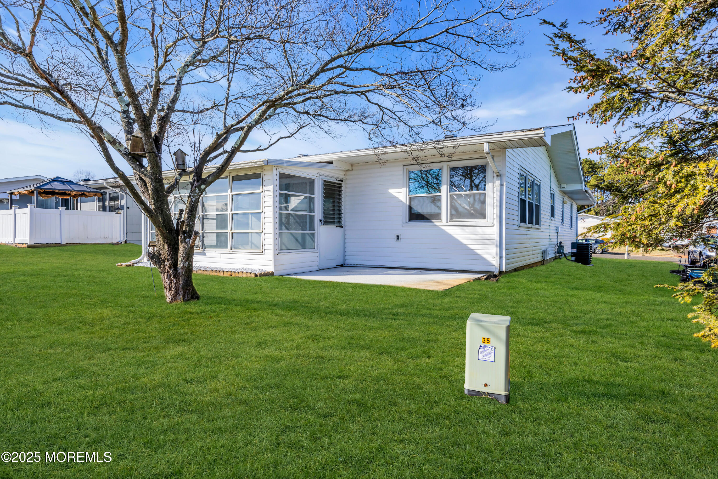 37 Central Boulevard Brick, NJ 08724 - Photo 31 of 32 a view of a house with a backyard
