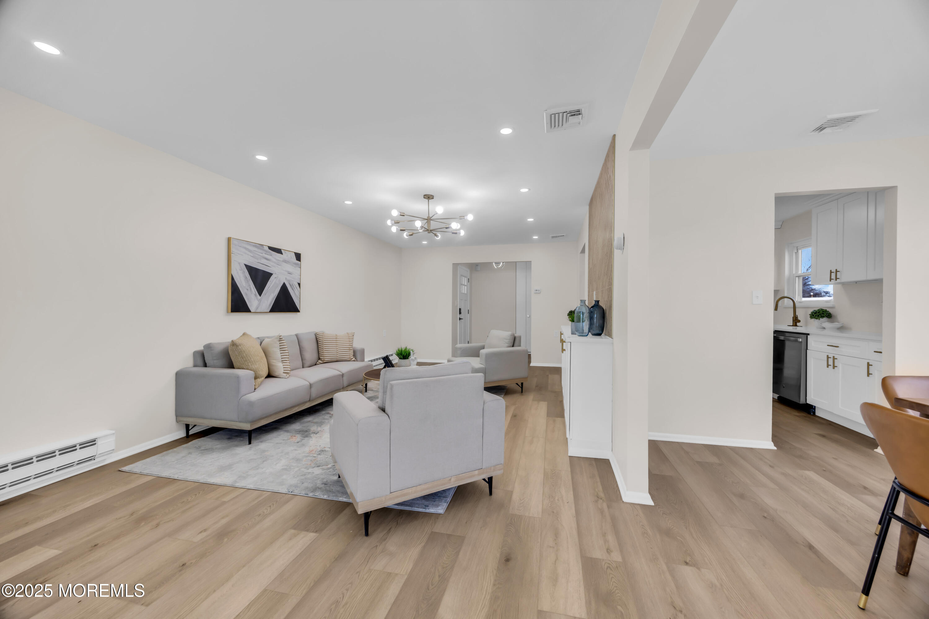 37 Central Boulevard Brick, NJ 08724 - Photo 9 of 32 a living room with furniture and a wooden floor