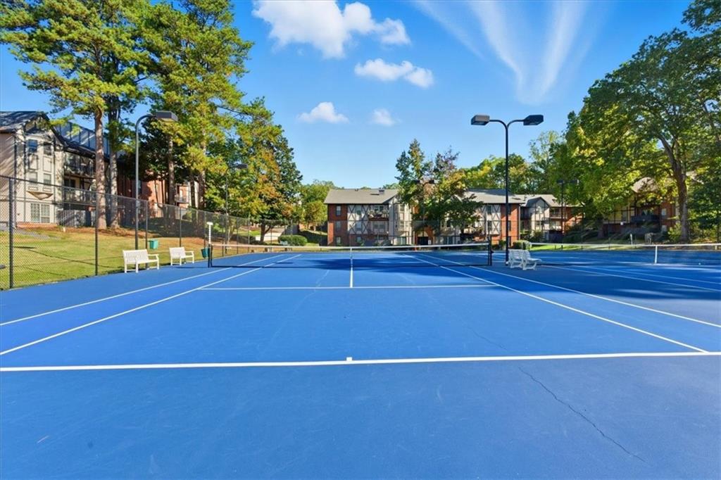 6851 Roswell Road, Unit J14 Sandy Springs, GA 30328 - Photo 26 of 41 a view of a tennis court