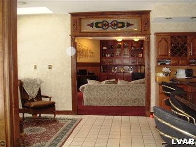 895 Gove Road Nazareth, PA 18064 - Photo 17 of 66 a living room with furniture and a rug