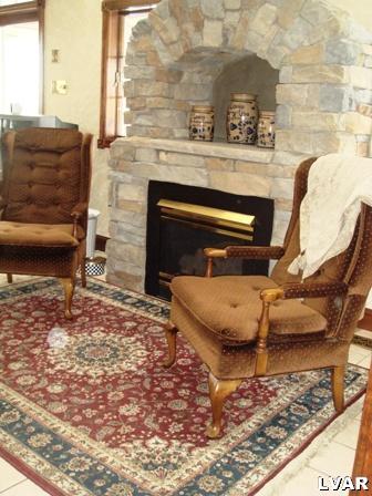 895 Gove Road Nazareth, PA 18064 - Photo 19 of 66 a living room with furniture and a fireplace