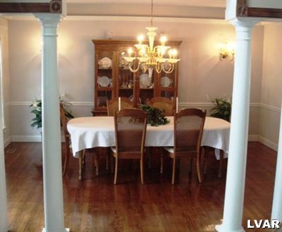 895 Gove Road Nazareth, PA 18064 - Photo 32 of 66 a view of a dining room with furniture and wooden floor