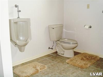 895 Gove Road Nazareth, PA 18064 - Photo 48 of 66 a bathroom with a toilet and a mirror