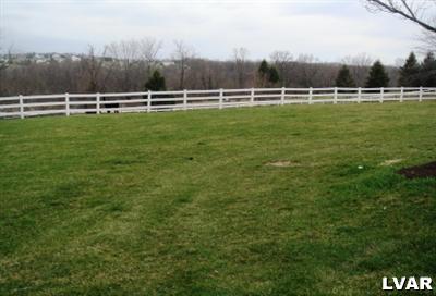 895 Gove Road Nazareth, PA 18064 - Photo 5 of 66 a view of a green field with trees in the background