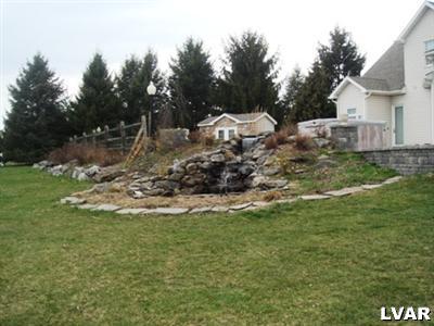 895 Gove Road Nazareth, PA 18064 - Photo 7 of 66 a view of a house with a yard
