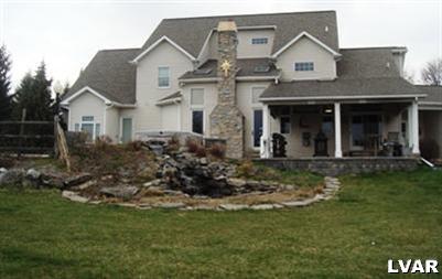 895 Gove Road Nazareth, PA 18064 - Photo 10 of 66 a front view of a house with a garden