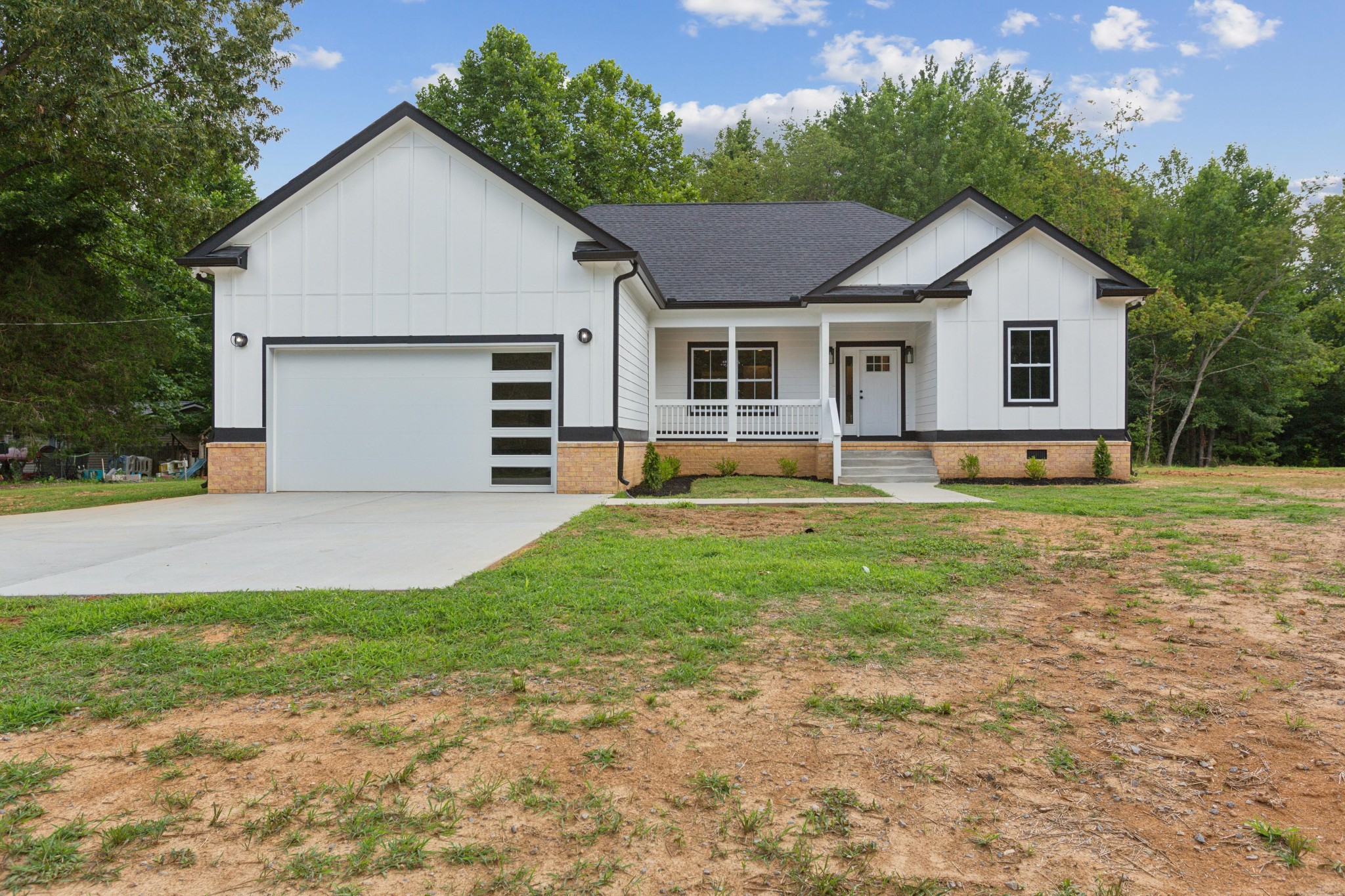 618 Scattersville Road Portland, TN 37148 - Photo 1 of 18 a front view of house with yard and green space