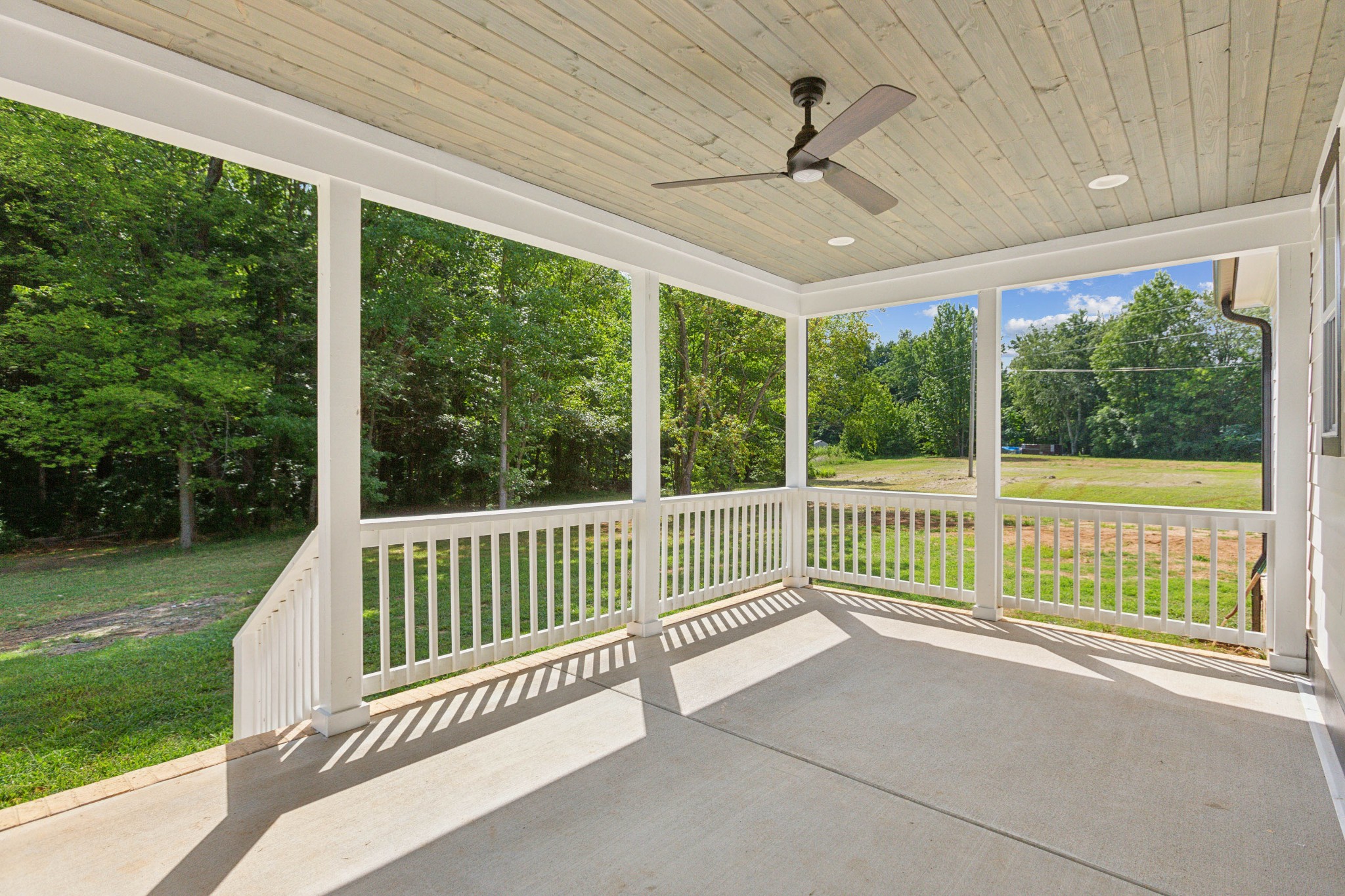 618 Scattersville Road Portland, TN 37148 - Photo 15 of 18 a view of porch with a floor to ceiling window and yard