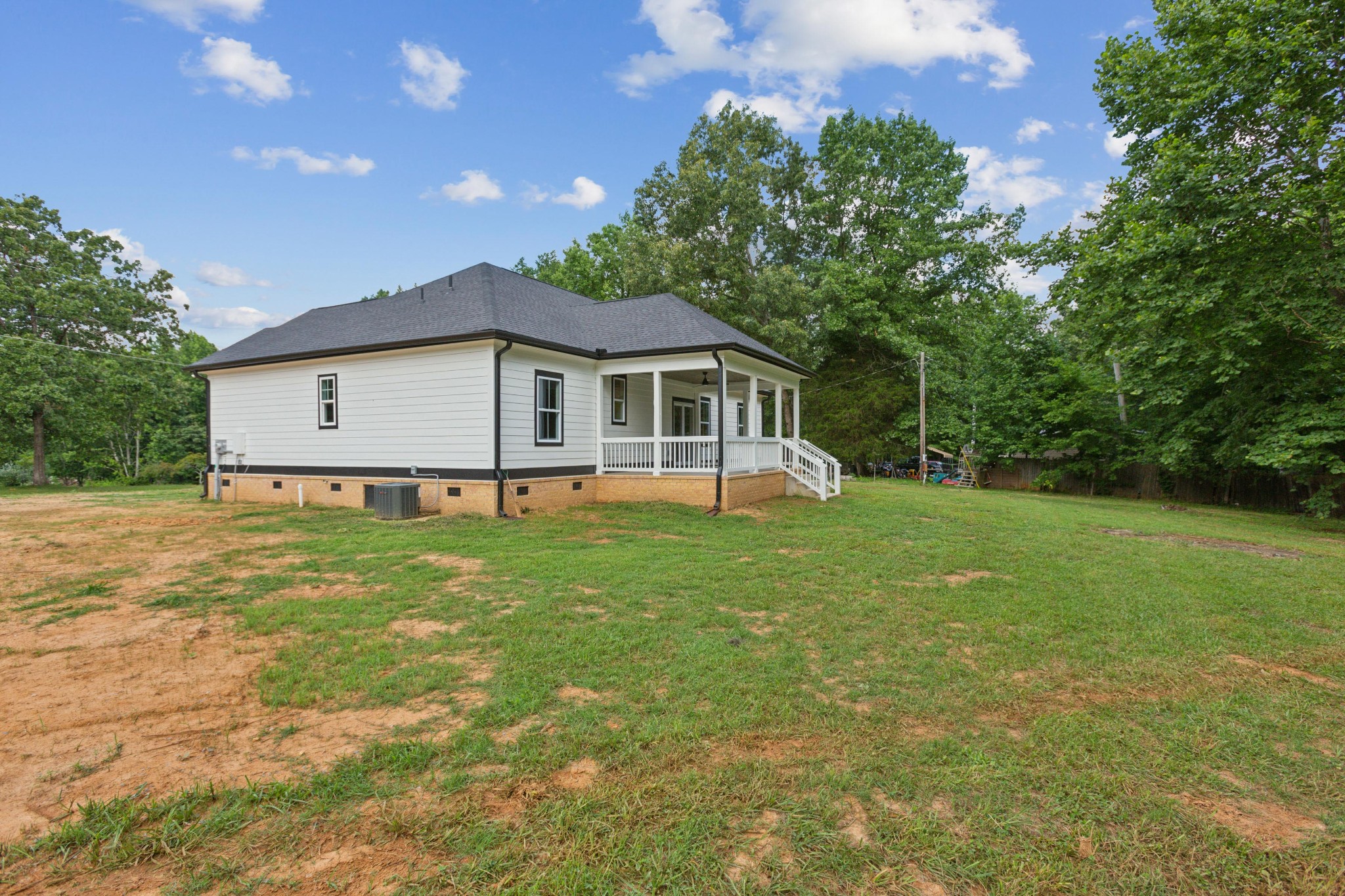 618 Scattersville Road Portland, TN 37148 - Photo 16 of 18 a view of a house with a yard