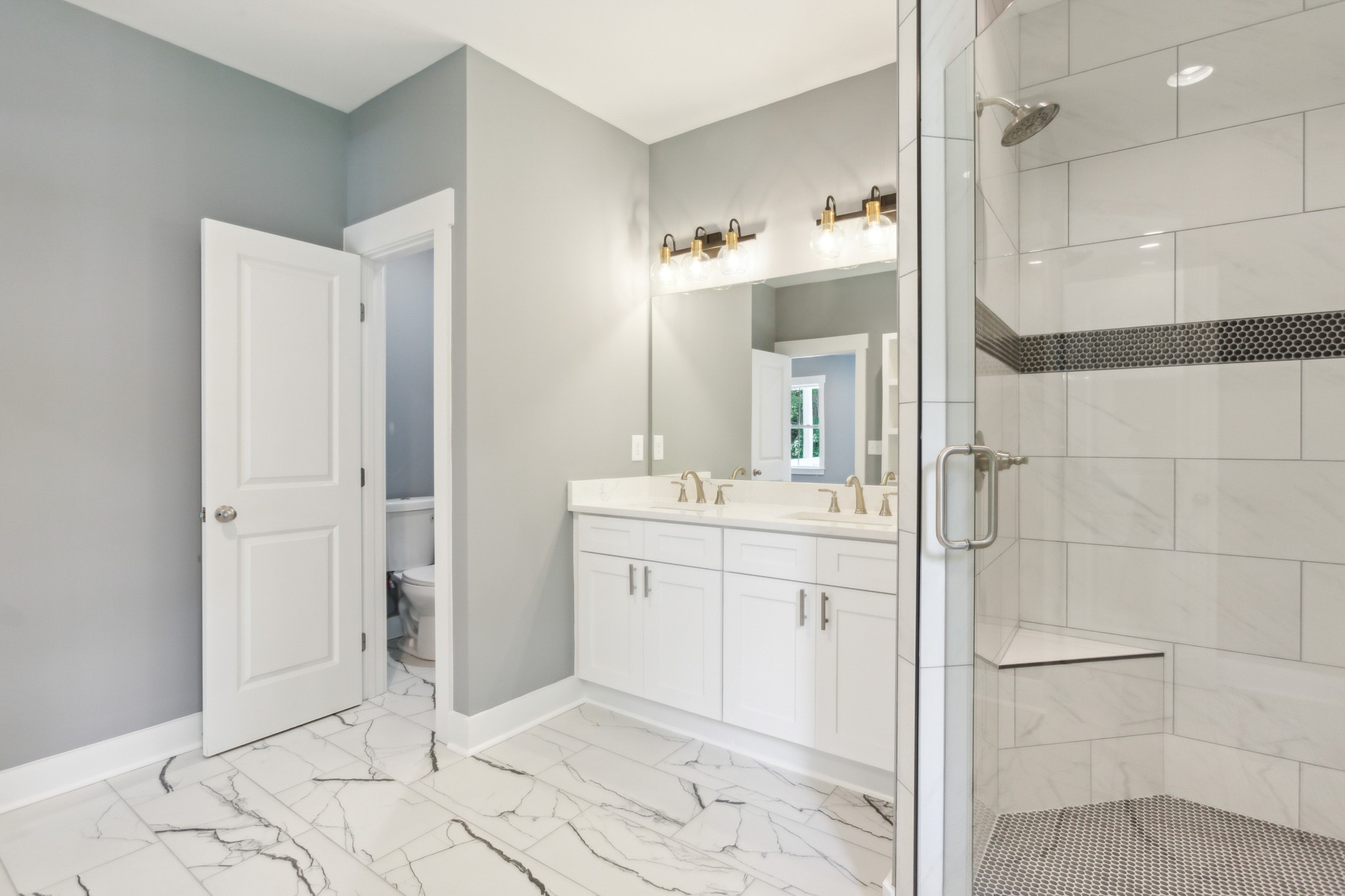 618 Scattersville Road Portland, TN 37148 - Photo 9 of 18 a bathroom with a shower sink and mirror