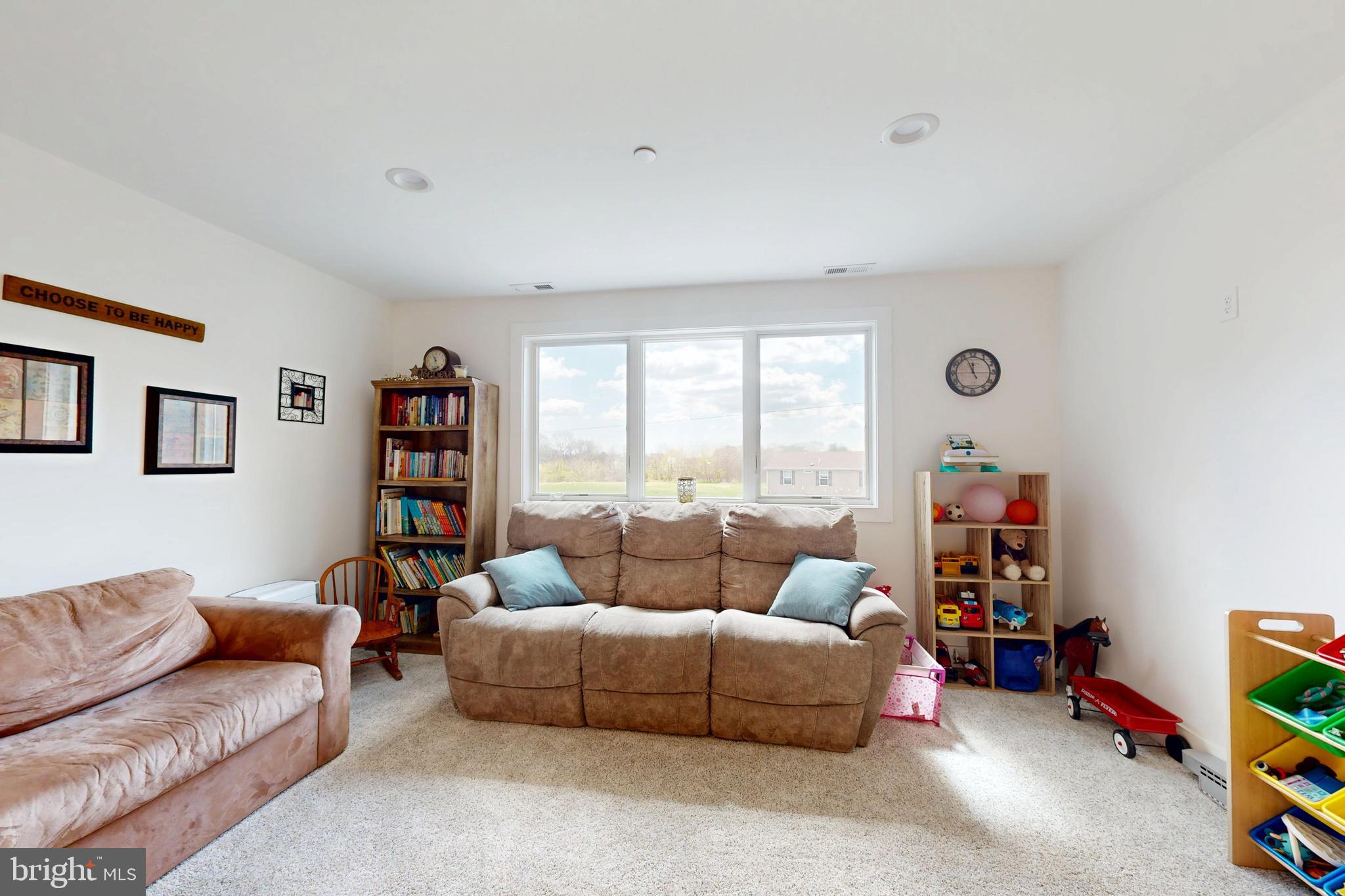 23730 Henry Road Ridgely, MD 21660 - Photo 24 of 28 a living room with furniture and a window