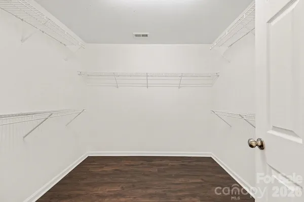 a view of a room with racks on the wall