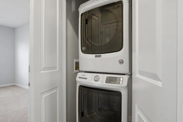 a utility room with washer and dryer
