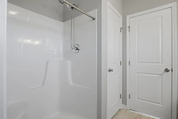 a view of a room with racks on the wall