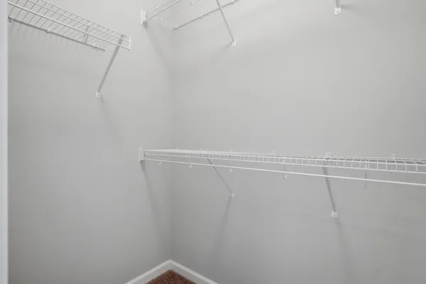 a view of a room with racks on the wall