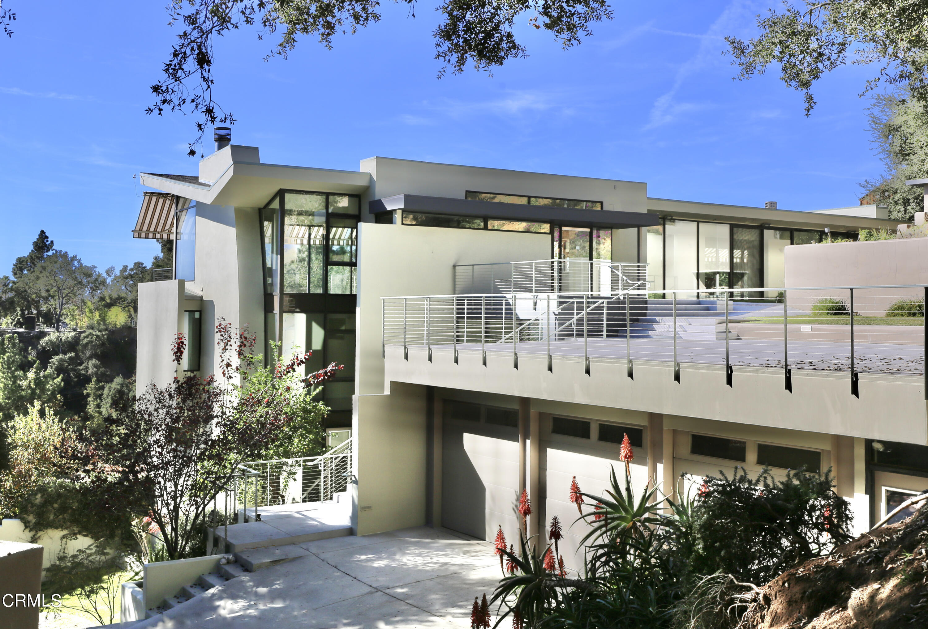 a front view of a building with garden