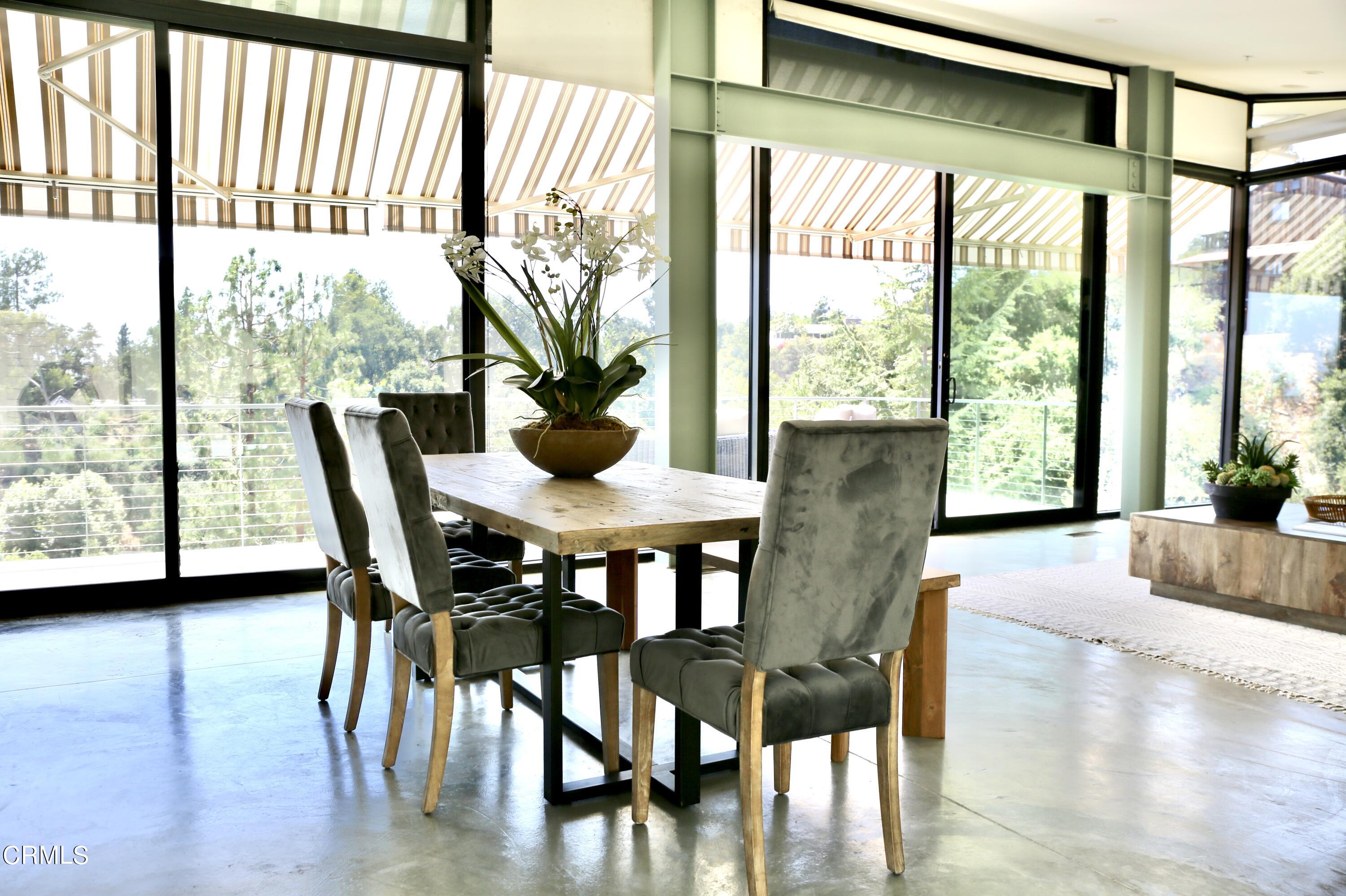 3555 Shaw Ranch Road Pasadena, CA 91107 - Photo 17 of 45 a view of a dining room with furniture window and wooden floor