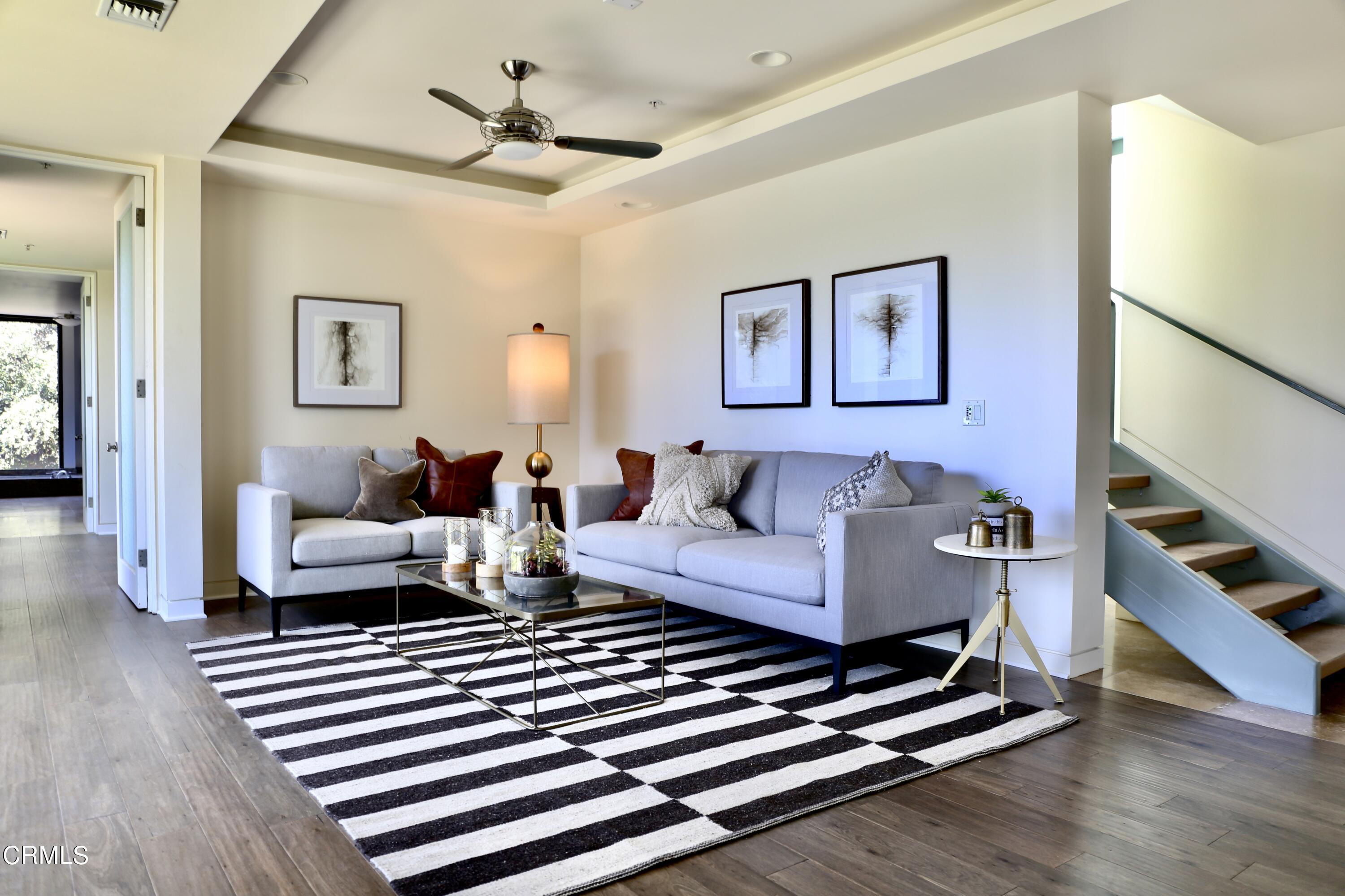 3555 Shaw Ranch Road Pasadena, CA 91107 - Photo 25 of 45 a living room with furniture and wooden floor