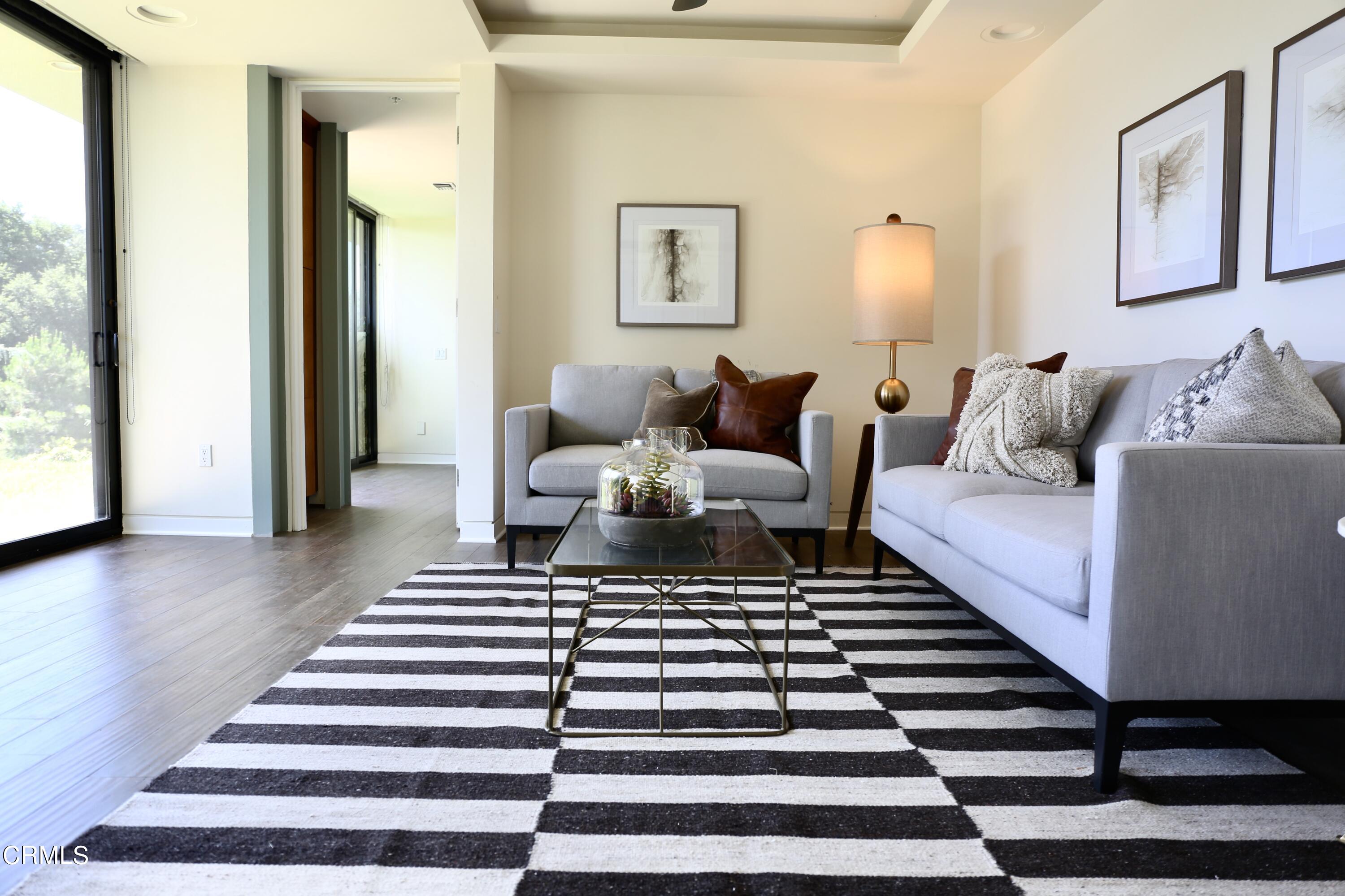 3555 Shaw Ranch Road Pasadena, CA 91107 - Photo 26 of 45 a living room with furniture and a rug