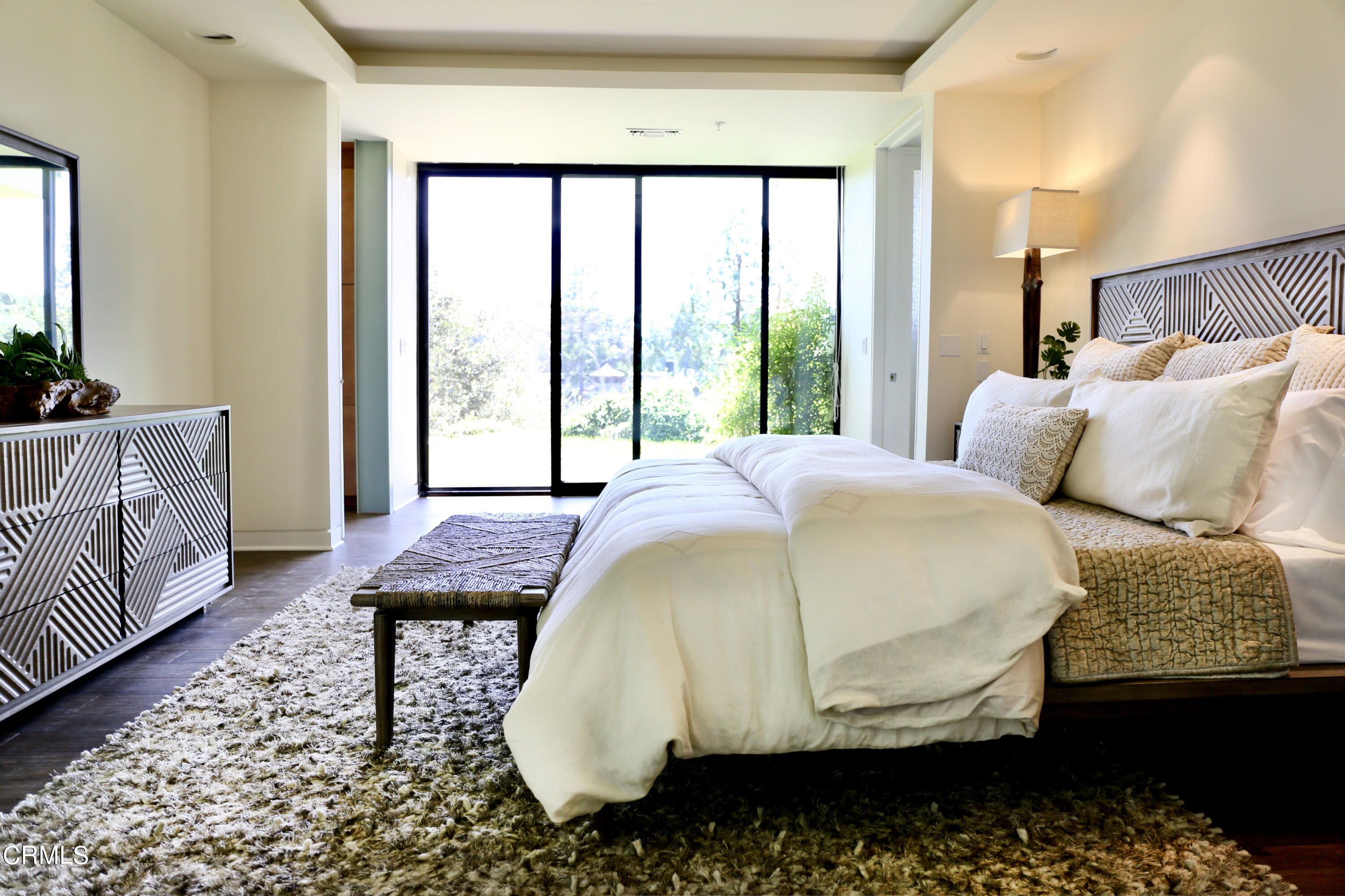 3555 Shaw Ranch Road Pasadena, CA 91107 - Photo 28 of 45 a bed sitting in a bedroom next to a window