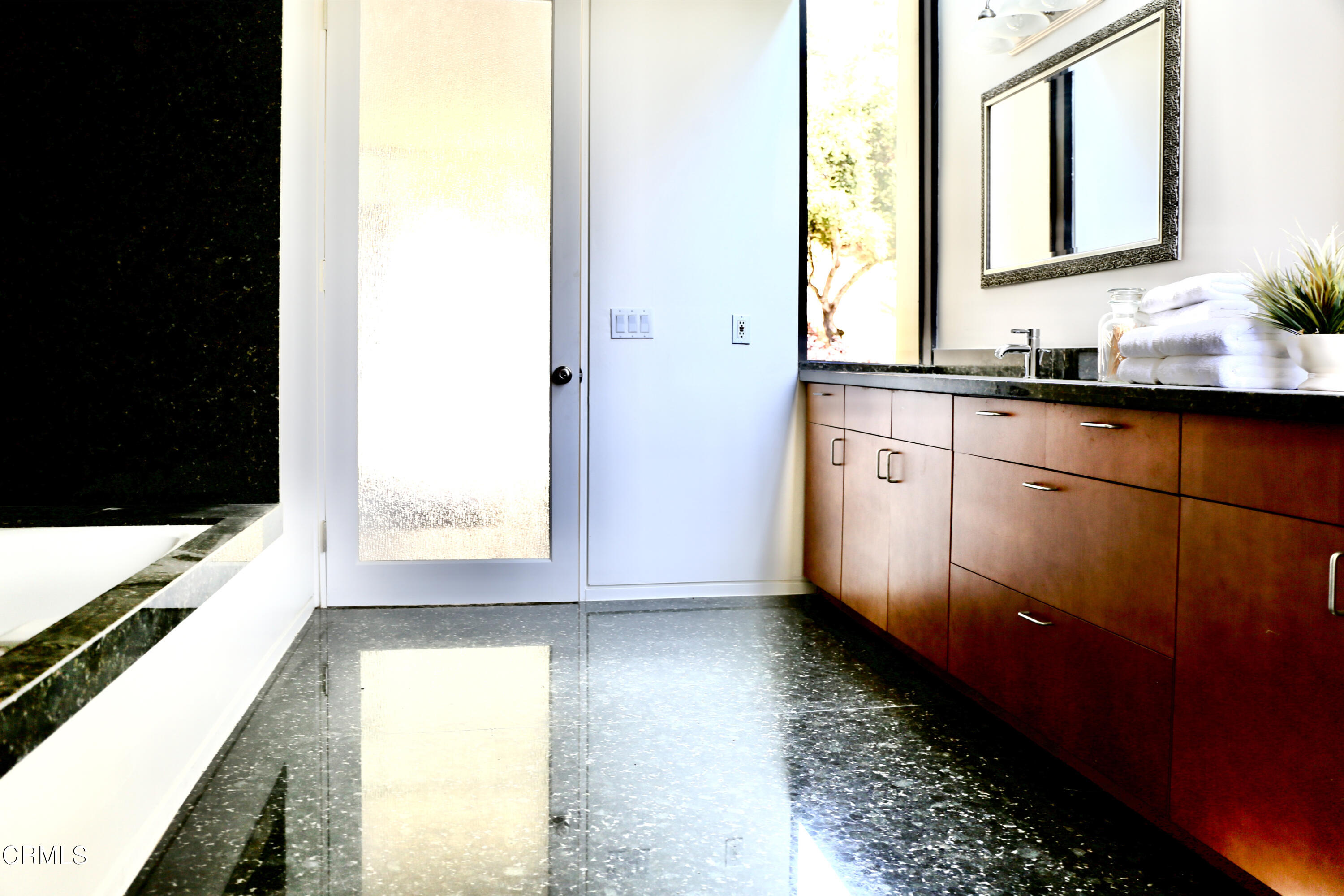 3555 Shaw Ranch Road Pasadena, CA 91107 - Photo 34 of 45 a bathroom with a sink and a mirror
