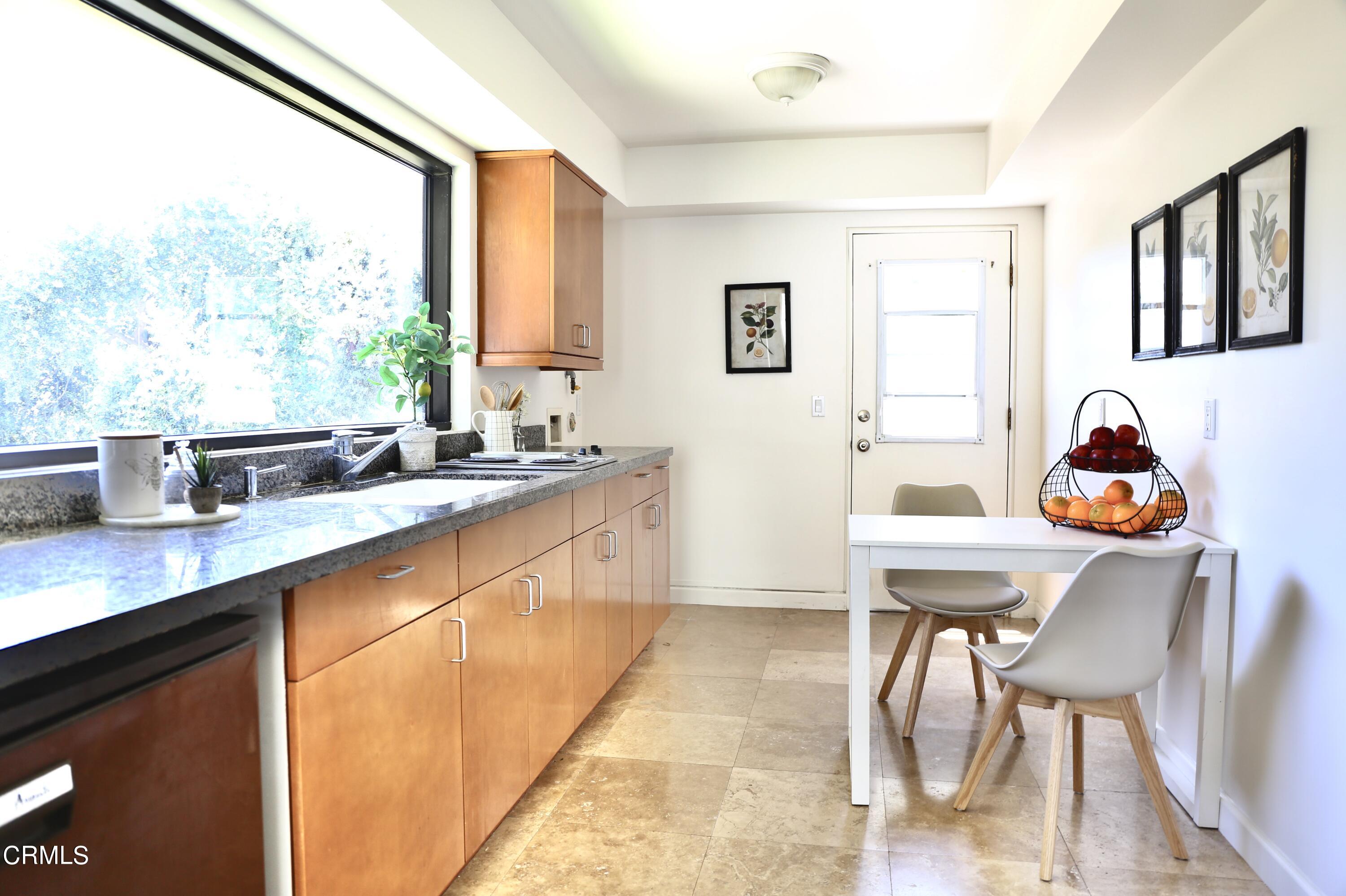 3555 Shaw Ranch Road Pasadena, CA 91107 - Photo 39 of 45 a very nice looking dining room with a large window and dining table