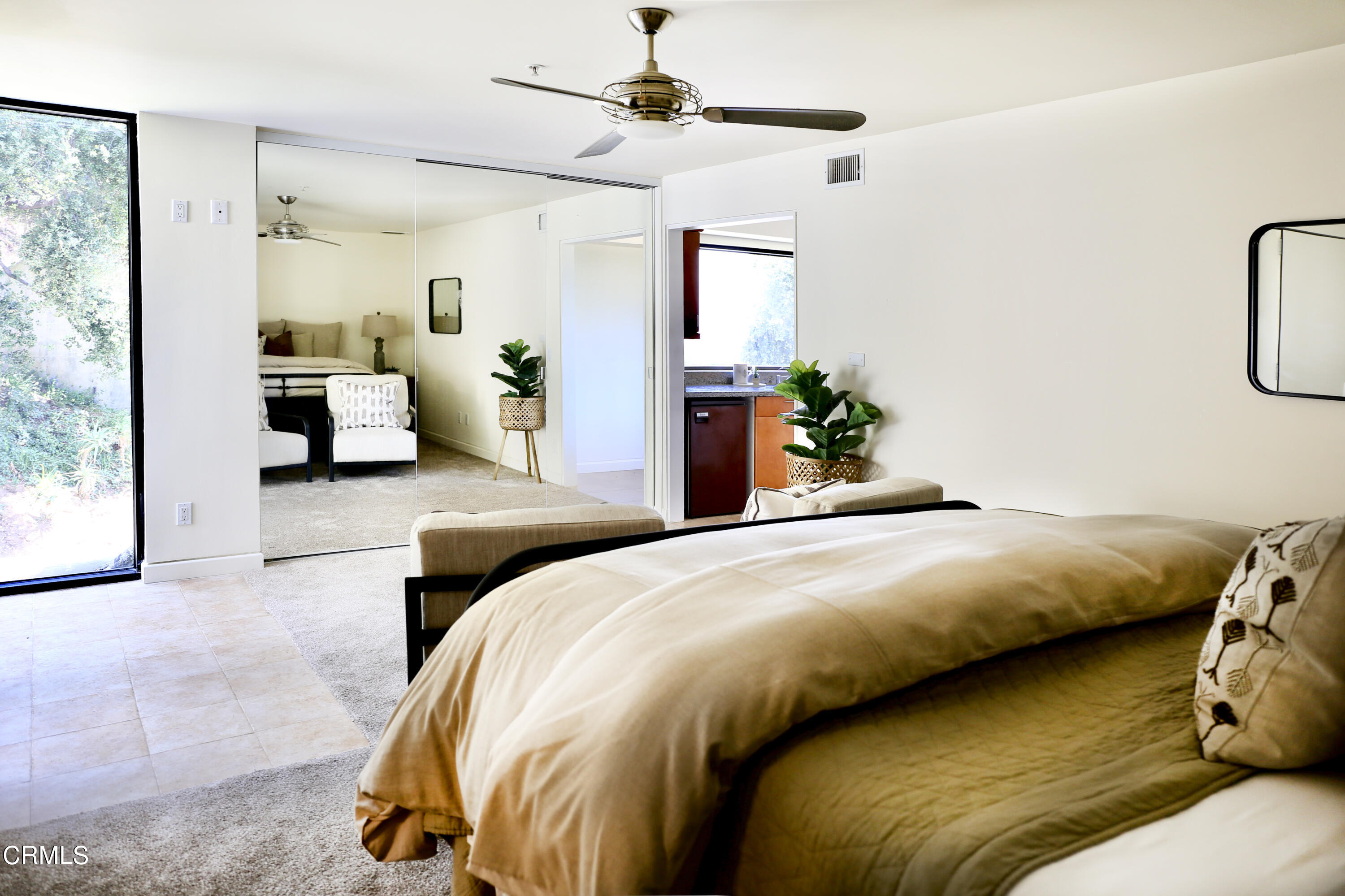 3555 Shaw Ranch Road Pasadena, CA 91107 - Photo 40 of 45 a bedroom with a bed and ceiling fan