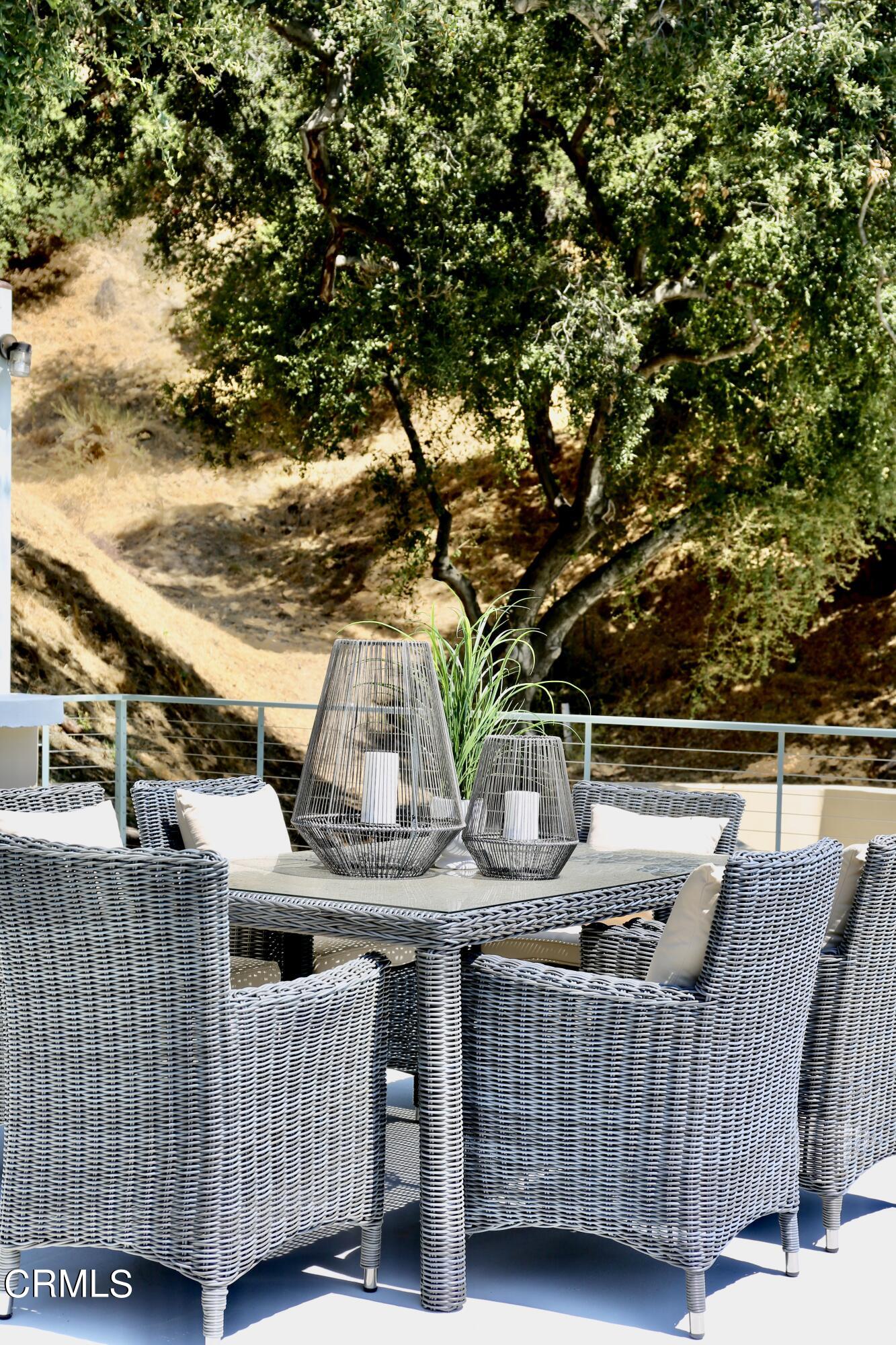 3555 Shaw Ranch Road Pasadena, CA 91107 - Photo 43 of 45 a terrace of a house with outdoor seating