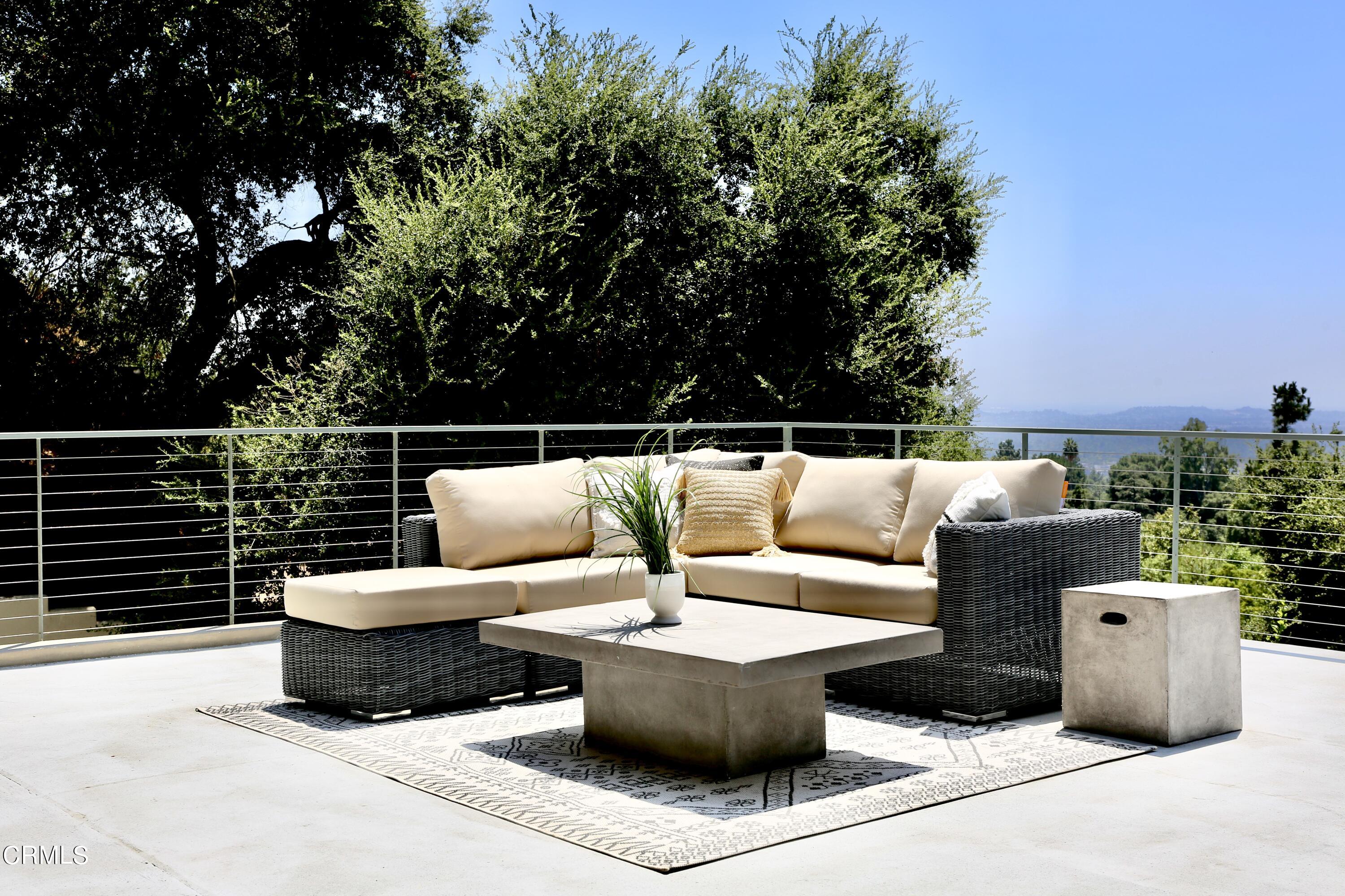 3555 Shaw Ranch Road Pasadena, CA 91107 - Photo 44 of 45 a view of a roof deck with couches and potted plants