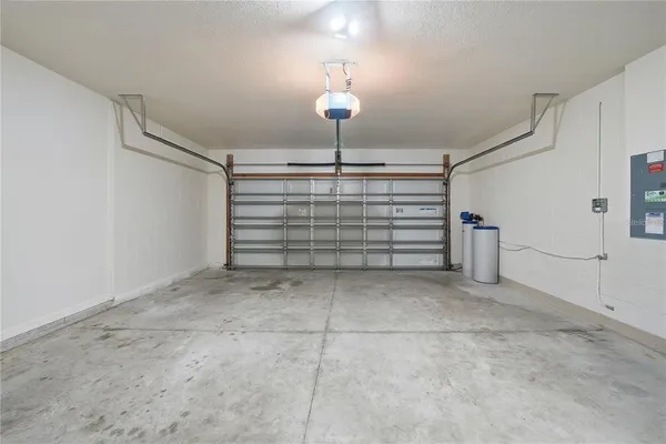 a view of room that has a bed in it