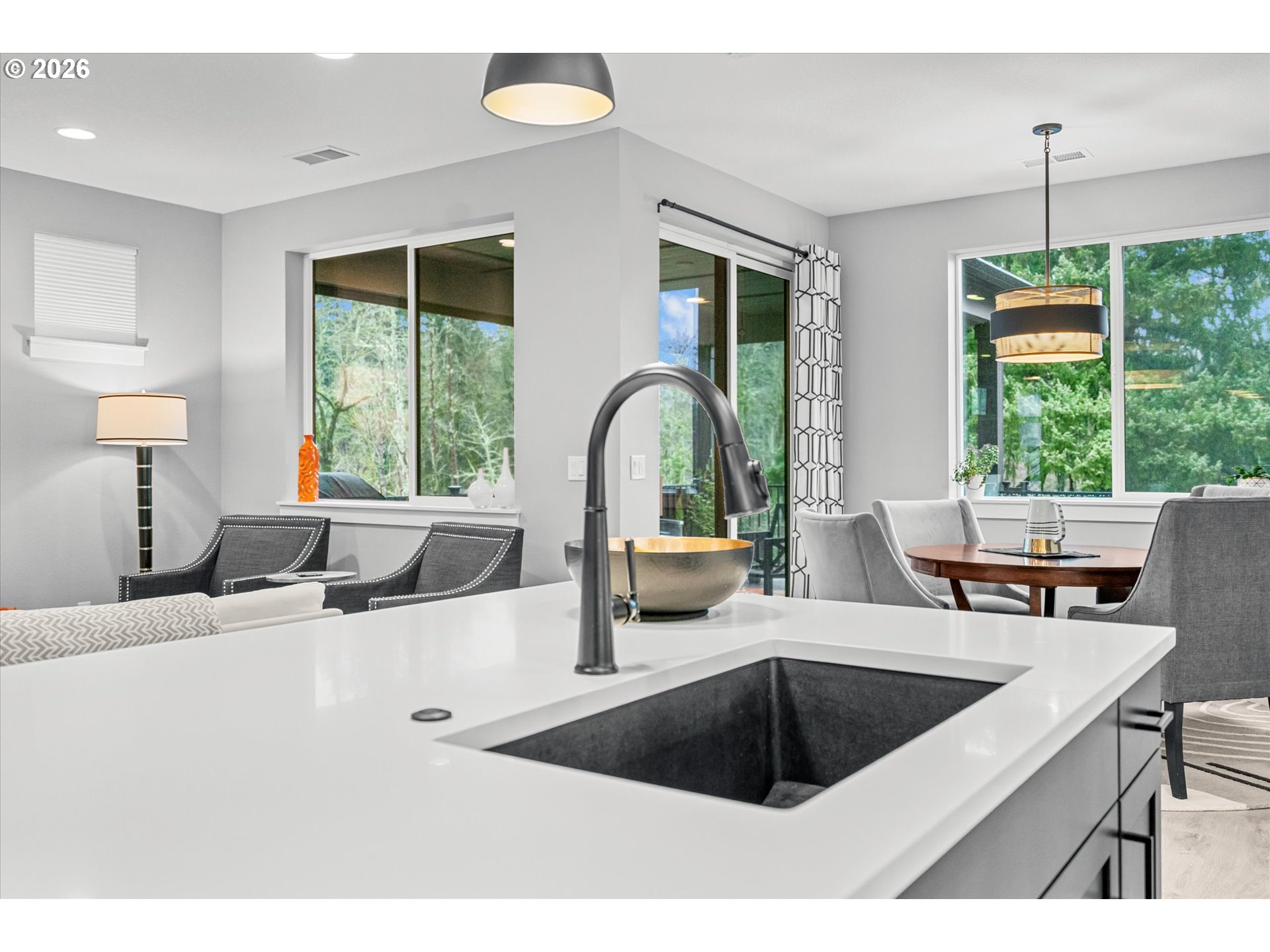 723 Southwest 49th Street Gresham, OR 97080 - Photo 15 of 48 a kitchen with a sink and a large window