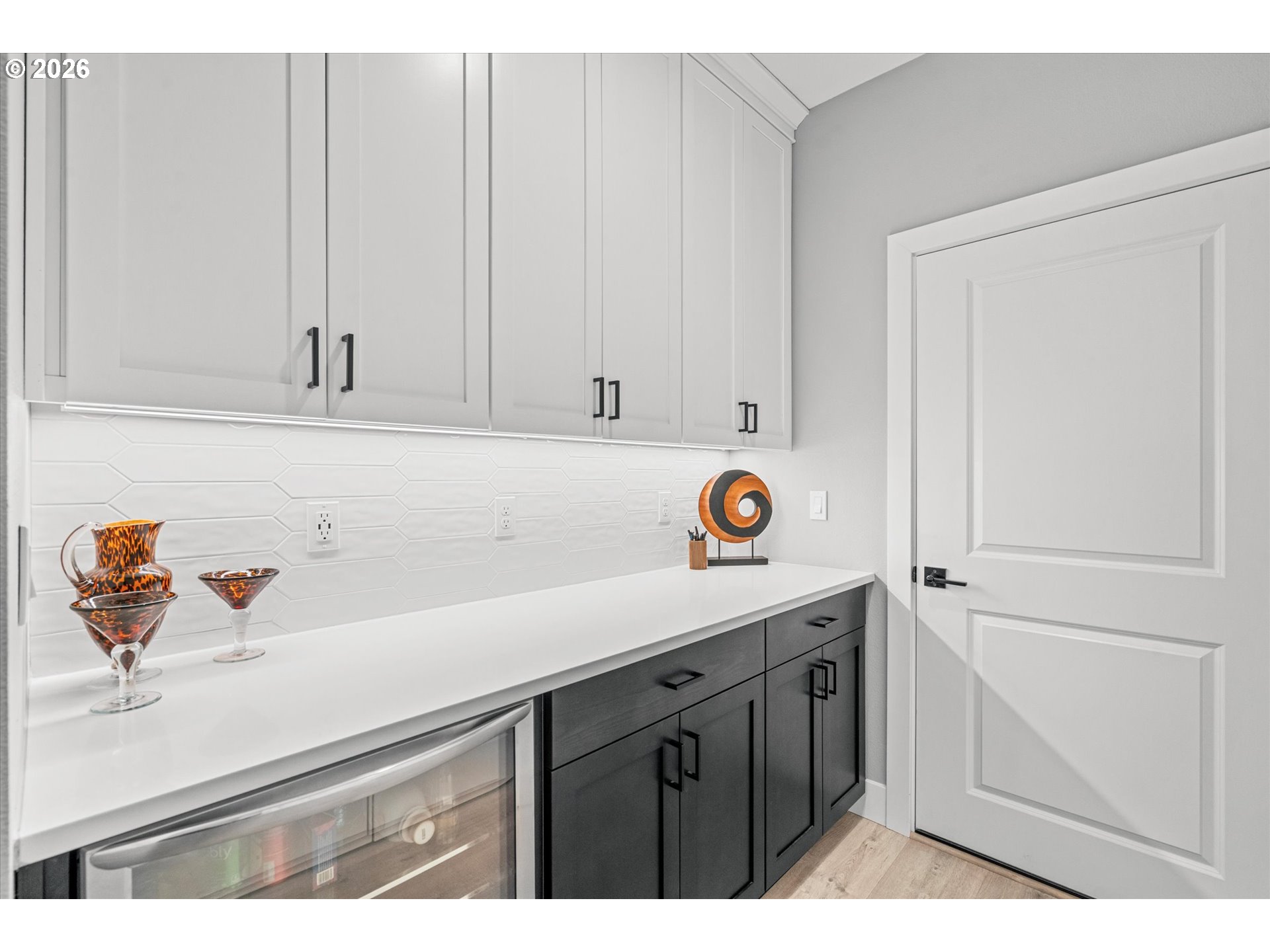 723 Southwest 49th Street Gresham, OR 97080 - Photo 18 of 48 a kitchen with a sink and cabinets