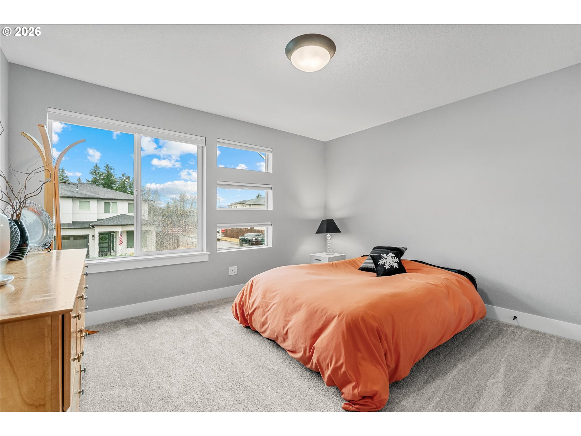 723 Southwest 49th Street Gresham, OR 97080 - Photo 26 of 48 a bedroom with a bed and a large window