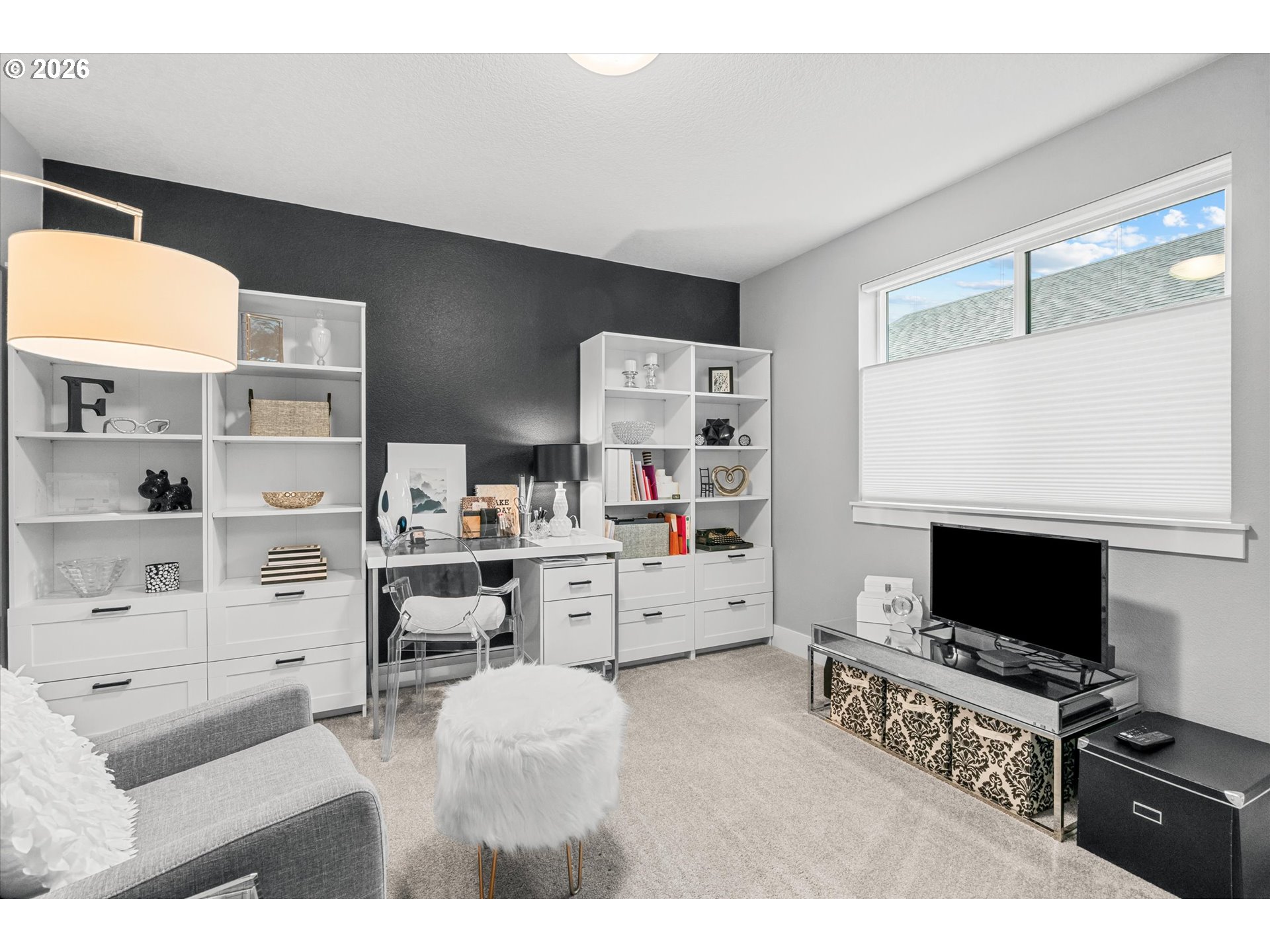 723 Southwest 49th Street Gresham, OR 97080 - Photo 30 of 48 a living room with furniture and a flat screen tv
