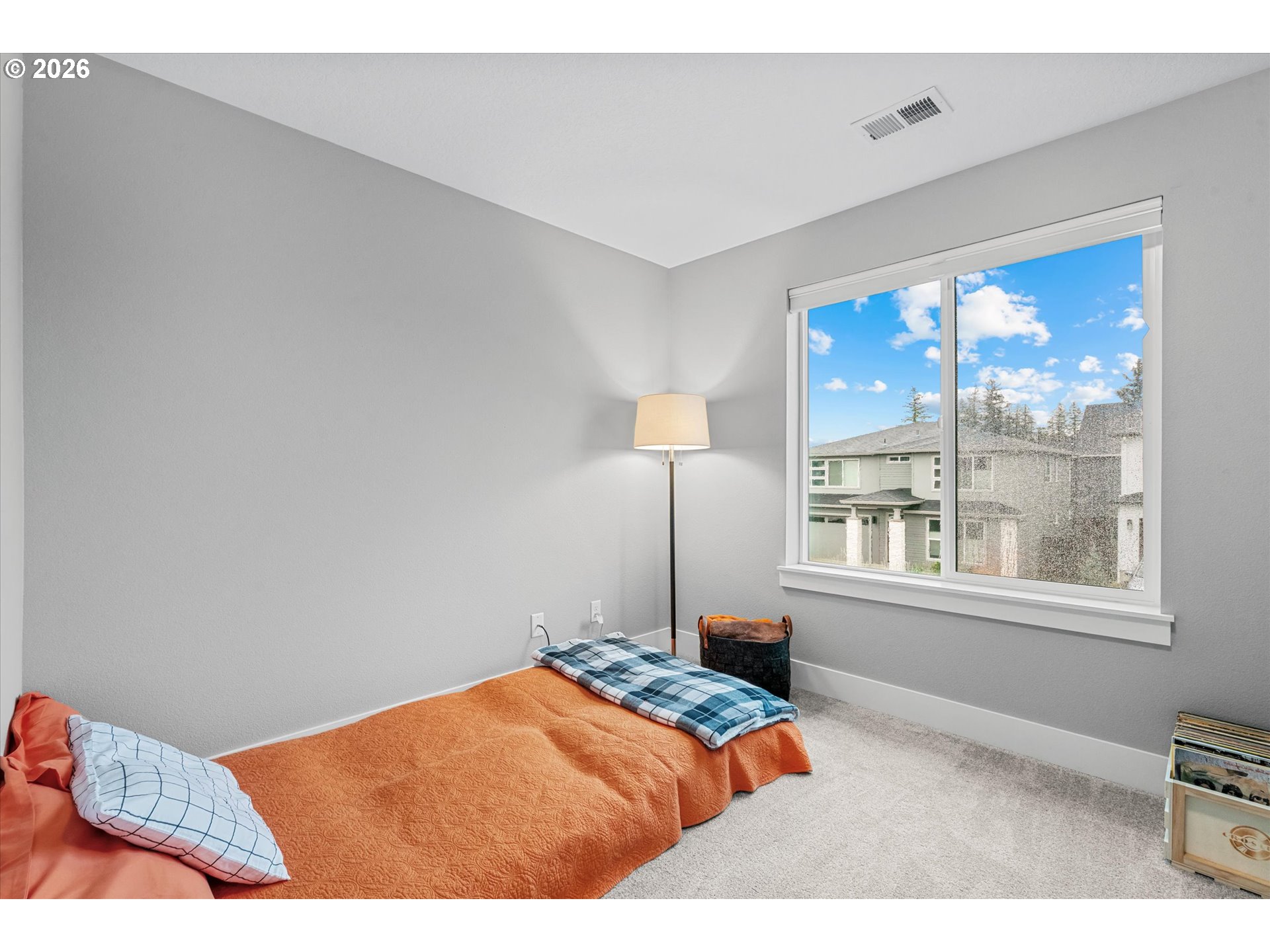 723 Southwest 49th Street Gresham, OR 97080 - Photo 32 of 48 a bedroom with a bed and a window