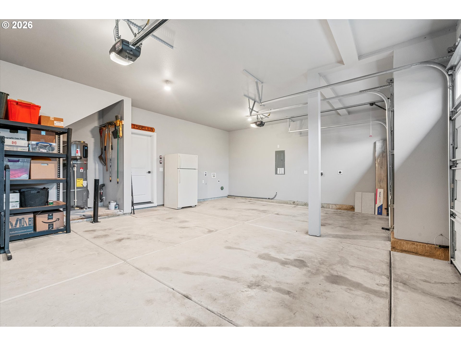 723 Southwest 49th Street Gresham, OR 97080 - Photo 43 of 48 a view of a livingroom with a furniture staircase and a ceiling fan