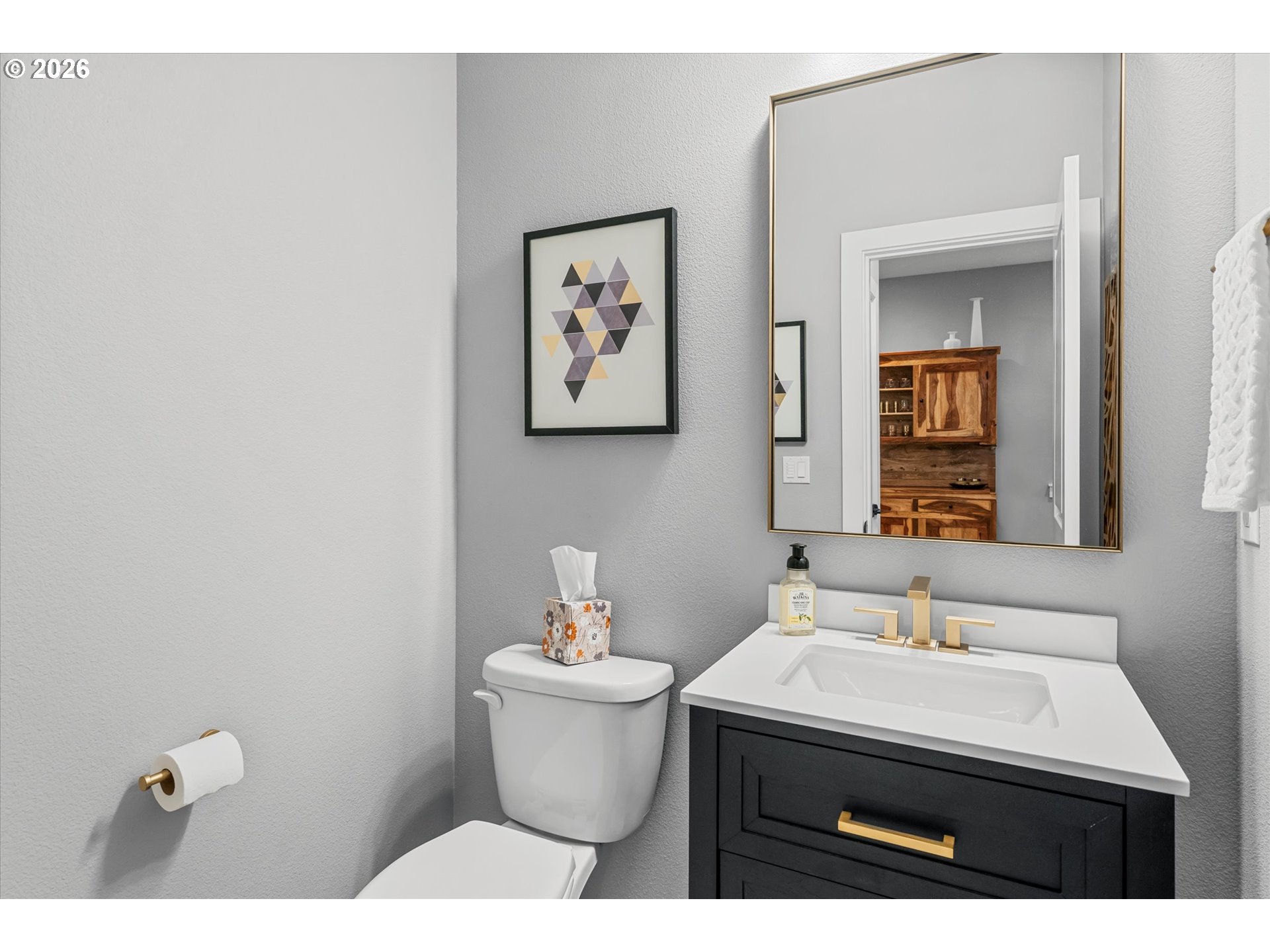 723 Southwest 49th Street Gresham, OR 97080 - Photo 5 of 48 a bathroom with a sink and a mirror