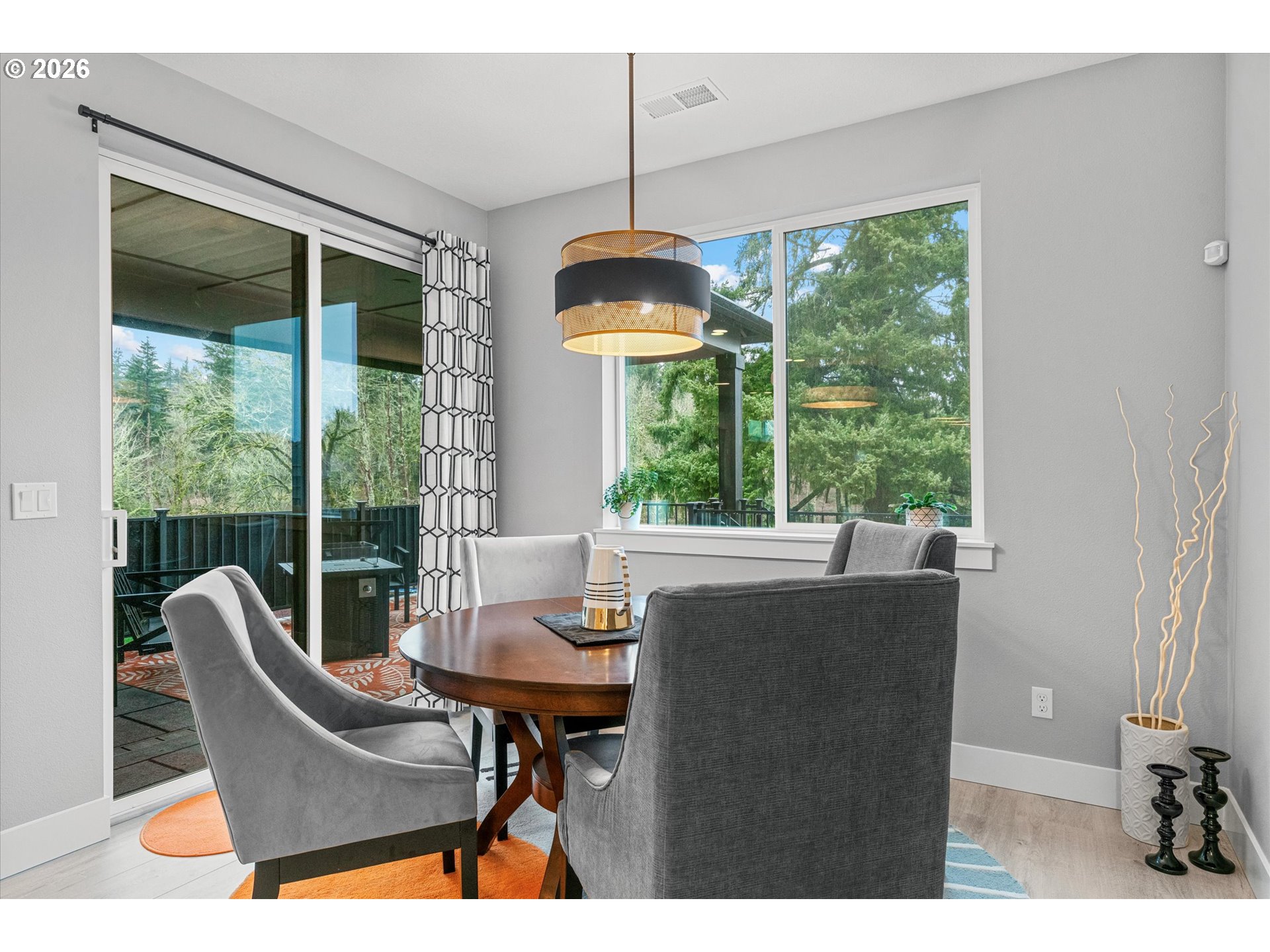 723 Southwest 49th Street Gresham, OR 97080 - Photo 10 of 48 a view of a dining room with furniture window and outside view
