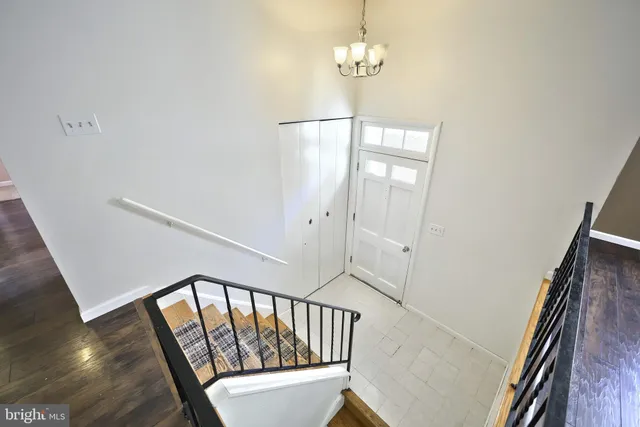 a view of dining room with furniture and wooden floor
