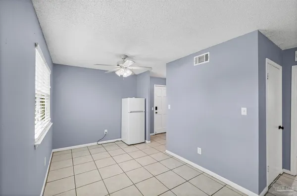 a view of an empty room with window
