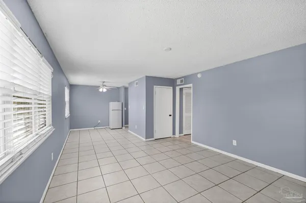 a view of an empty room with window