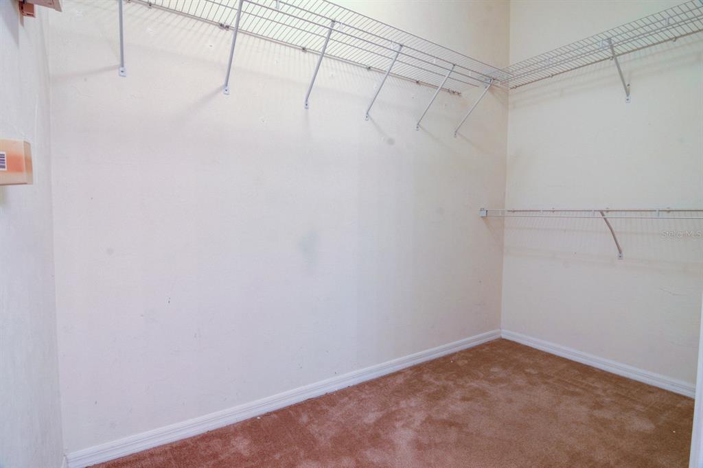 1563 Northwest 29 Road, Unit 108 Gainesville, FL 32605 - Photo 21 of 25 a view of a room with racks on the wall