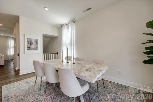 a view of a dining room with furniture