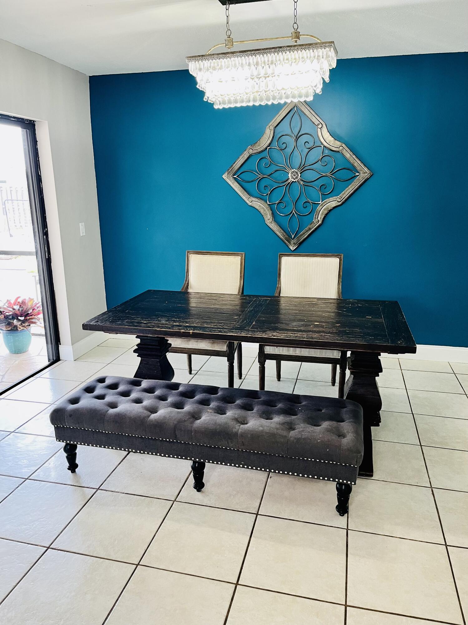4730 Betelnut Street Boca Raton, FL 33428 - Photo 12 of 42 a view of kitchen island with furniture